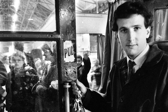 Market supervisor Philip Edge prepares to lock the doors of the old Wigan Market Hall for the last time before closure on Saturday 16th of January 1988.