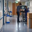 Tens of thousands of patients were waiting for routine treatment at Wigan's hospitals in May