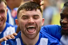 Jonny Smith celebrates his 'worldie' against Fulham on Saturday