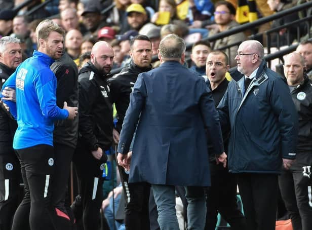Chris Wilder and Shaun Maloney have a slight difference of opinion at Watford on Saturday