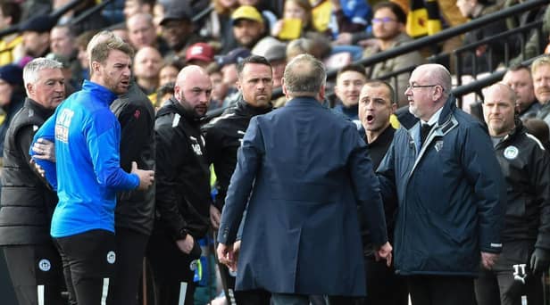 Chris Wilder and Shaun Maloney have a slight difference of opinion at Watford on Saturday