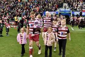 Sam Powell led the team out ahead of kick off