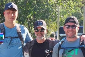 David Hopper, centre, completed the three peaks challenge with his nephew Sam Huxley, left, and best friend Darren Greenall, right