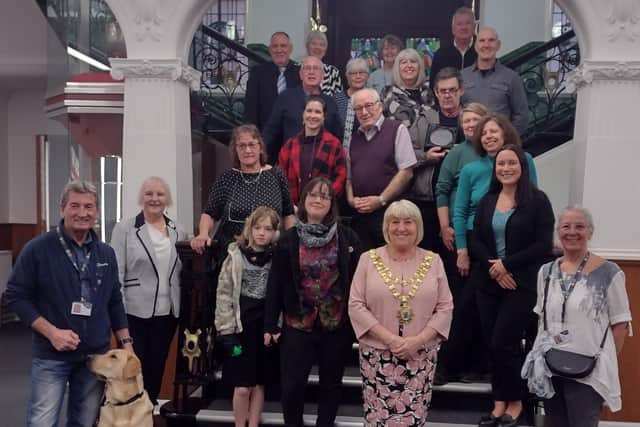 Mayor of Wigan Coun Marie Morgan with members of community groups from Atherleigh