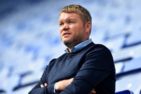 Grant McCann watches on as his Hull City side are beaten 8-0 by Latics during the first lockdown in 2020