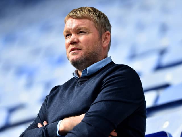 Grant McCann watches on as his Hull City side are beaten 8-0 by Latics during the first lockdown in 2020