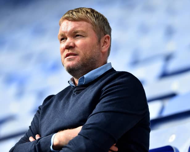 Grant McCann watches on as his Hull City side are beaten 8-0 by Latics during the first lockdown in 2020