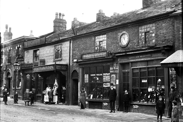 Farrington and Son on Wigan Lane advertising artificial limbs, cork boots, appliances for infantile paralysis and curvature of the legs. Made to order. Next door is James Jackson advertising corned beef and pickled tongues around the turn of the 20th century.