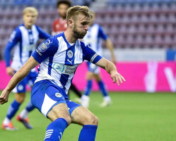Callum McManaman led Latics out for the first time in a competitive fixture against Morecambe on Tuesday night