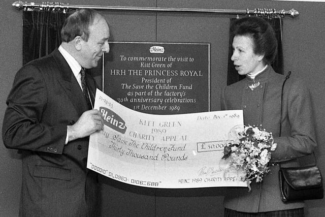 1989 - Princess Anne is presented with a £30,000 cheque for the Save the Children Fund, of which she was president, by Derek Dollman, Chairman of Heinz Kitt Green Fund Raising Committee.  Sadly Derek died of a heart attack shortly after the princess left the factory.
