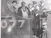 Driver Harry Maybury and Fireman Stan Makin are joined on the footplate of Class J10 loco No 5077 by two lady porters, Guard George Nuttall and Shunter Harry Fish, with an unidentified plate layer at the front. (Author's Collection).
