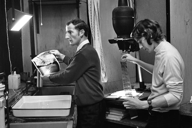 Photographers in the darkroom at the Post and Chronicle newspaper at Brock Mill in Leyland Mill Lane in 1971.