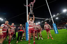 Kai Pearce-Paul lifts the Betfred Super League trophy