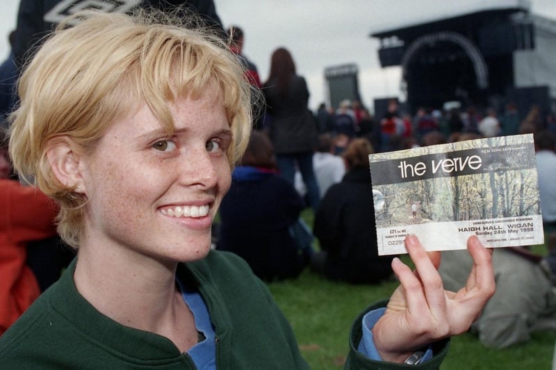 A young fan, who travelled from Canada for the gig, shows off her ticket