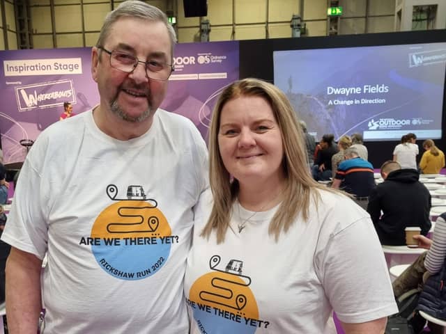 Peter Perks and Bekah Bamba wearing their promo Are We There Yet India, Rickshaw Challenge t-shirts.
