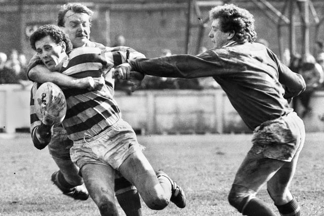Wigan full-back Barry Williams attempts to burst through against St. Helens in the Good Friday league clash at Central Park on 1st of April 1983 which Wigan won 13-6.