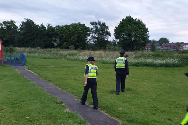 Police patrolling a playground in Worsley Mesnes