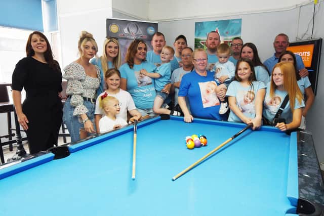 Family and friends join competitors at the charity pool event in memory of Charlie Wilkinson
