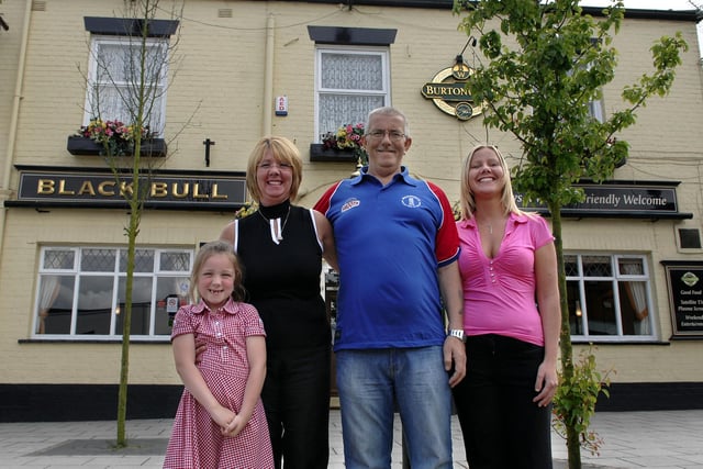 2008  - Ann and John Chadwick, landlady and landlord of the Black Bull pub, Standish, with daughter and barmaid Annette and grandaughter Nicol.