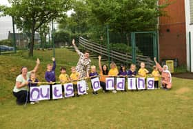 Children and staff at Hindley Nursery School in Wigan celebrating their second "Outstanding" Ofsted score in a row. 
Picture: Hindley Nursery School