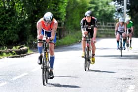 Ironman competitors heading through Standish in 2017