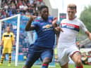Tyler Blackett during his Manchester United days, getting stuck into Latics' Max Power during a friendly at the DW in 2016