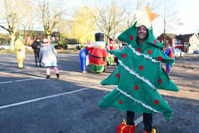 Tony Taylor, pictured at last year's fancy dress charity walk, is organising another one to raise funds for good causes in Wigan