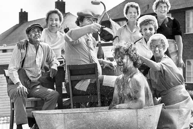 Tea in the tub for members of Standish Labour Club at Standish Carnival on Saturday 4th of August 1979.