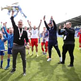 Leam Richardson lifts the League One title at Shrewsbury