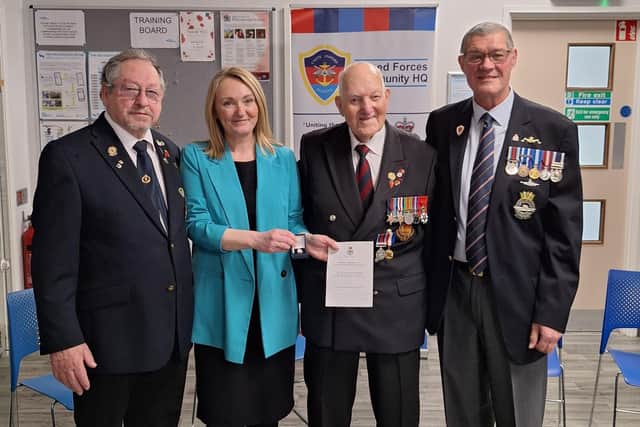 Left to right: Stan Crane, Jo Platt, Eric Radcliffe and Charlie Neve, a director at the Armed Forces headquarters in Wigan