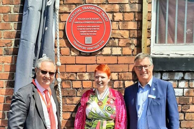 Deputy Lieutenant Melanie Bryan OBE (centre), Jerry Swift – Deputy Chair of the National Transport Heritage Trust (left) and Richard Parry, CEO Canal and River Trust (right)