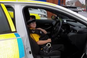 Harvey Dean-Evans went for a ride in a police car