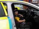 Harvey Dean-Evans went for a ride in a police car