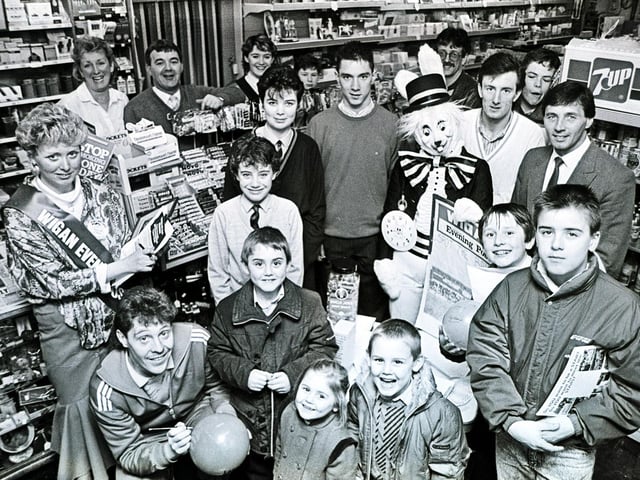 Latics boss Ray Mathias calls in to a Wigan newsagent to promote sales of the Wigan Evening Post
