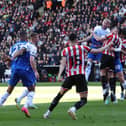 Jack Whatmough heads for goal at Sheffield United
