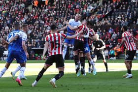 Jack Whatmough heads for goal at Sheffield United