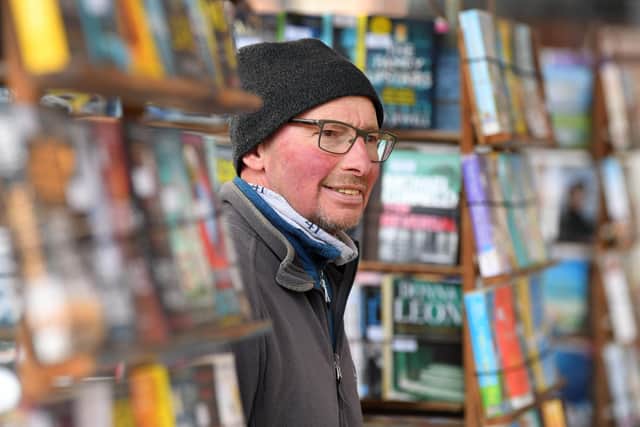 Derek Walsh on Derek's Books stall, Preston Market