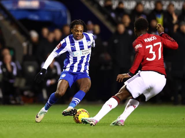 Martial Godo in action for Latics against Manchester United in last season's FA Cup third round