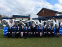 Staff and pupils at St Wilfrid's CE Primary School celebrate being rated "outstanding" by Ofsted