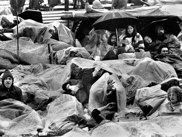 The miserable conditions suffered by music fans in the pouring rain at the Bickershaw Festival in 1972.
