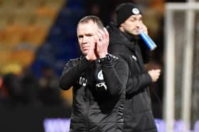 Glenn Whelan made three changes to the Latics team for his first game in charge at Mansfield