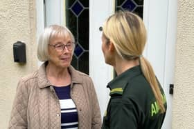 Community Specialist Paramedic Sara Harris with member of the public