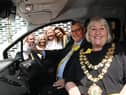 Mayor of Wigan Coun Marie Morgan in the new van with consort Coun Clive Morgan and the team at Daffodils Dreams