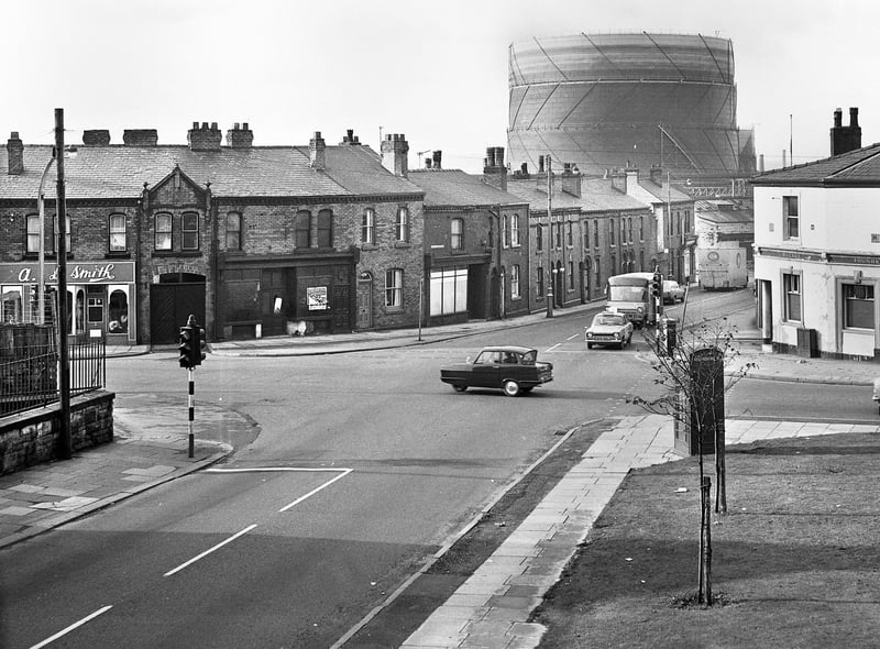 The junction of Darlington Street and Warrington Lane with the Foundry Inn on the right and Wigan gas works in the background in the late 1960s.