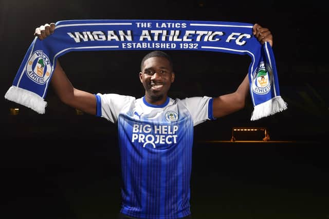 Christ Tiehi is free to make his Latics debut this weekend