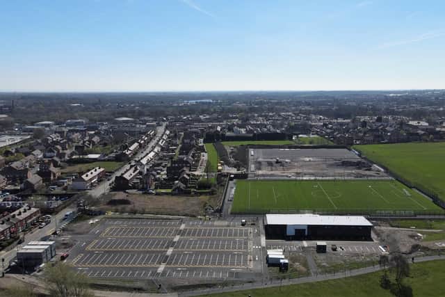 This new drone camera shot of the Laithwaite Park football hub shows that one of the pitches is ready for action and a car park has also been established. Scot Lane is on the left