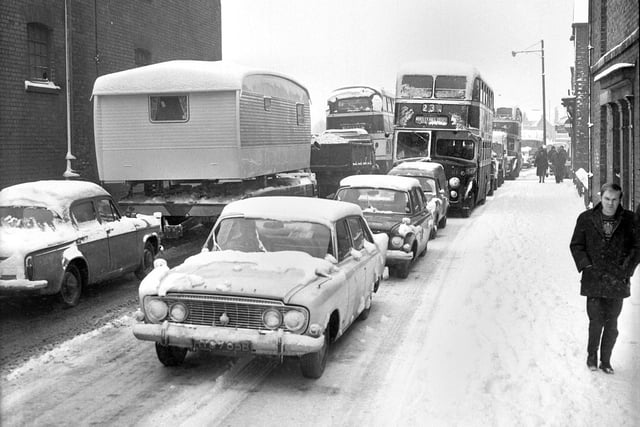 A traffic jam in Wigan caused by a heavy snow fall in 1969.