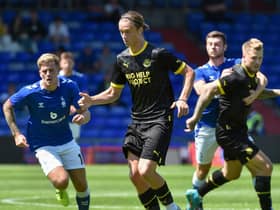 Wigan Athletic beat Oldham in their pre-season meeting