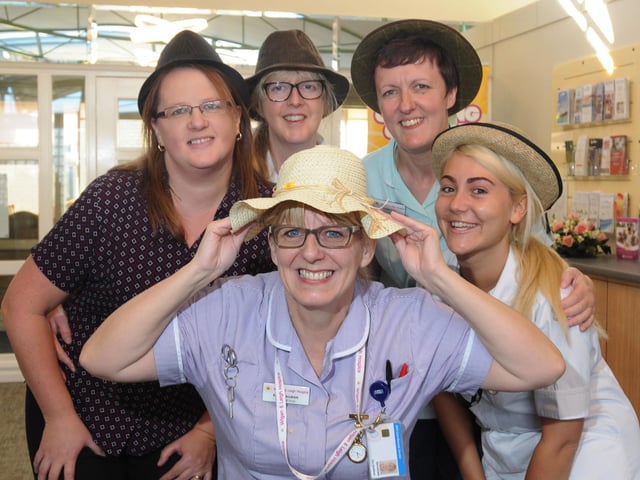 Staff and volunteers at Wigan and Leigh Hospice wear headgear during Hats for Hospice Day