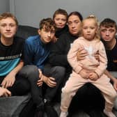 Kerry Stroud, with children, from left, Kyle,16, Josh, 18, Alex, 10, Kerry Stroud, Lexi, five, and Jake, 22, her other son Austin isn't pictured.